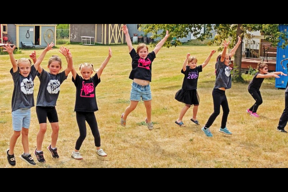 Young dance students showed what they learned at dance camp at De Tricky Feet dance studio, as they entertained at Weyburn's Heritage Village Days on Friday afternoon.