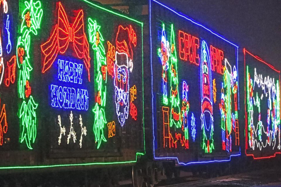 The brightly-lit CPKC Holiday Train rolled into Weyburn in the midst of a blizzard on Wednesday evening, but the stage show went on as planned with donations to the local food bank.