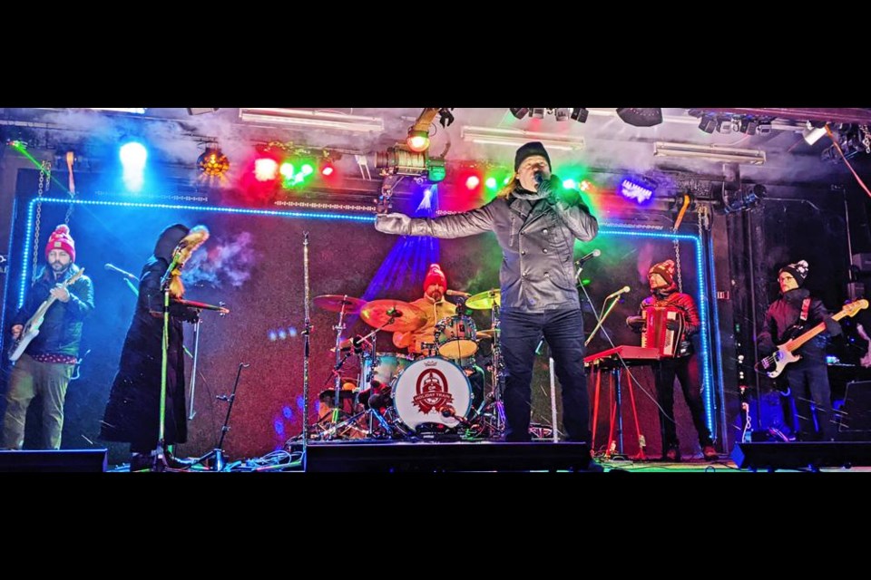 Singer Alan Doyle and the CP Holiday Train band entertained the crowd on a cold Sunday evening in Weyburn.