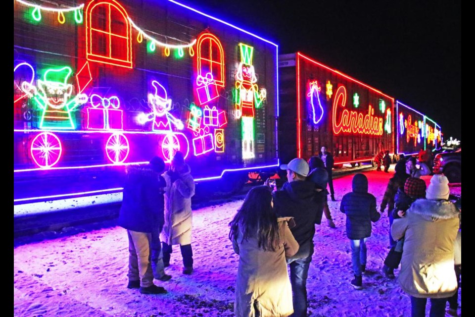 Many Weyburn families did selfies and portraits in front of the bright lights of the CPKC Holiday Train in 2023.