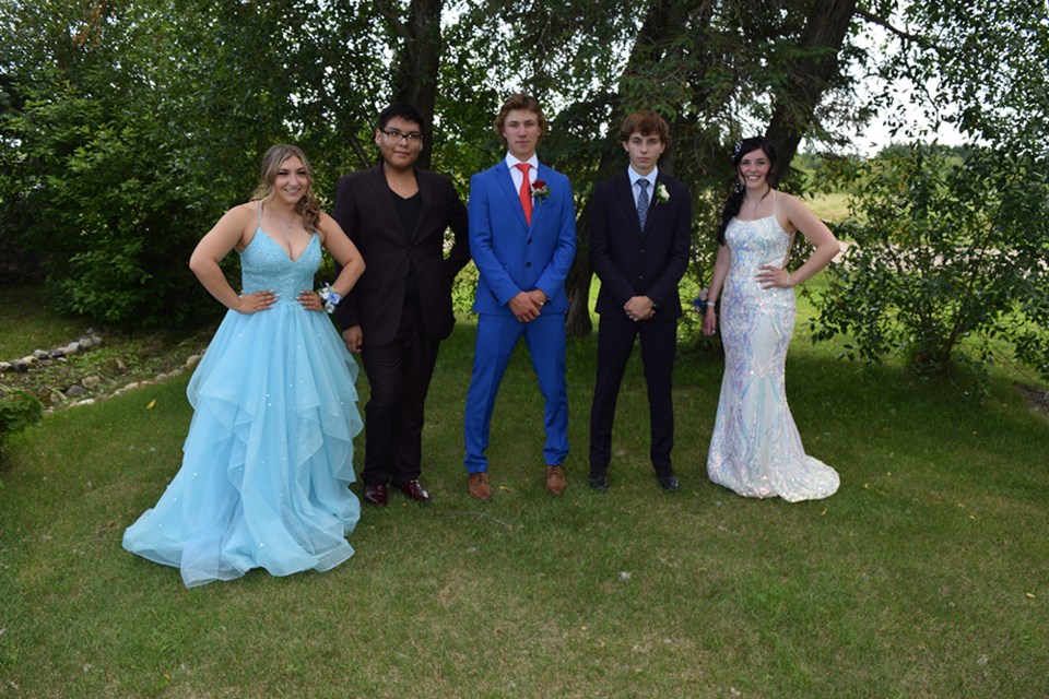 Invermay School graduates were honoured on June 29. From left, were: Hallie Pozniak, David Keller, Nathaniel Minhinnick, Jesse Grychowski and Kayla Dubas. The photo was taken at the Grotto of our Lady of Lourdes in Rama. 