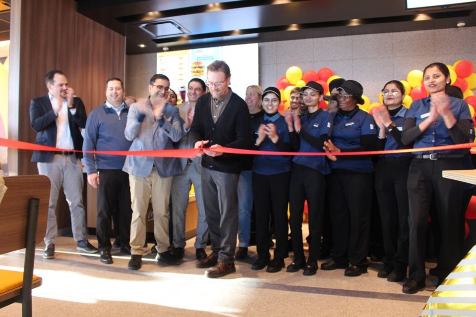 Mayor Aaron Kienle was honoured with ribbon cutting duties for the new McDonald's location.