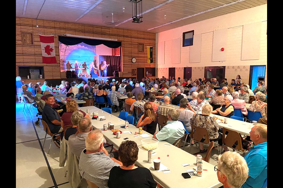 The Louisiana Hayride’s Gil and Lori Risling, members of Meota Lakefront Paddle and Sail, entertained alongside key musicians at a fundraiser for the club.