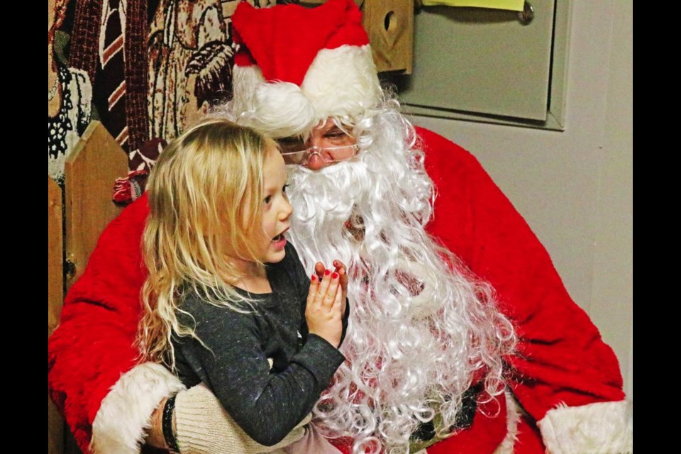 Santa was able to visit with many young children at the lunch held at the Curling Rink as part of the Santa parade in Midale last year.