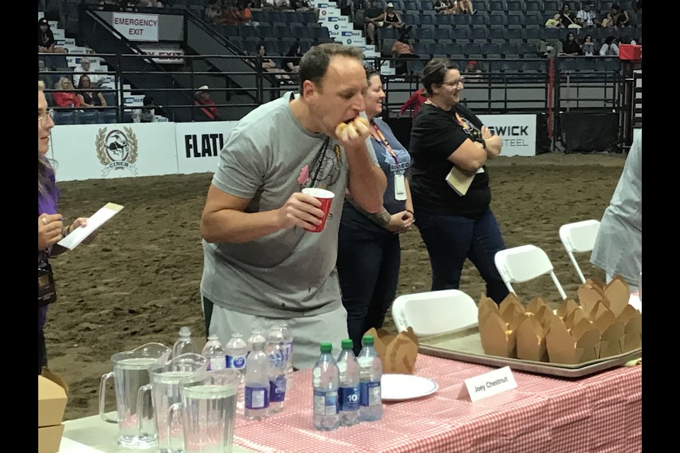 Joey Chestnut got off to a fast start in defending his mini-donut title in Regina.