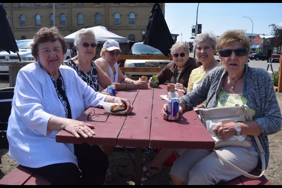 Canora in Bloom attracted many Canora residents as well as former residents who are always eager to “come home” and catch up with old friends. Enjoying the July 21 barbecue outside the CN Station House Museum and Visitor Centre, from left, were: Nettie Okrainetz (Canora), Olga Fulawka (Yorkton), Floreen Haskewich (Canora), Evelyn Kuruliak (Yorkton), Violet Ostafie (Canora) and Lucy Toffan (Yorkton). Toffan's husband Nestor was the Canora door-to-door milkman for many years until the practice was discontinued in 1977 by the Dairy Producers Co-operative plant at Yorkton.