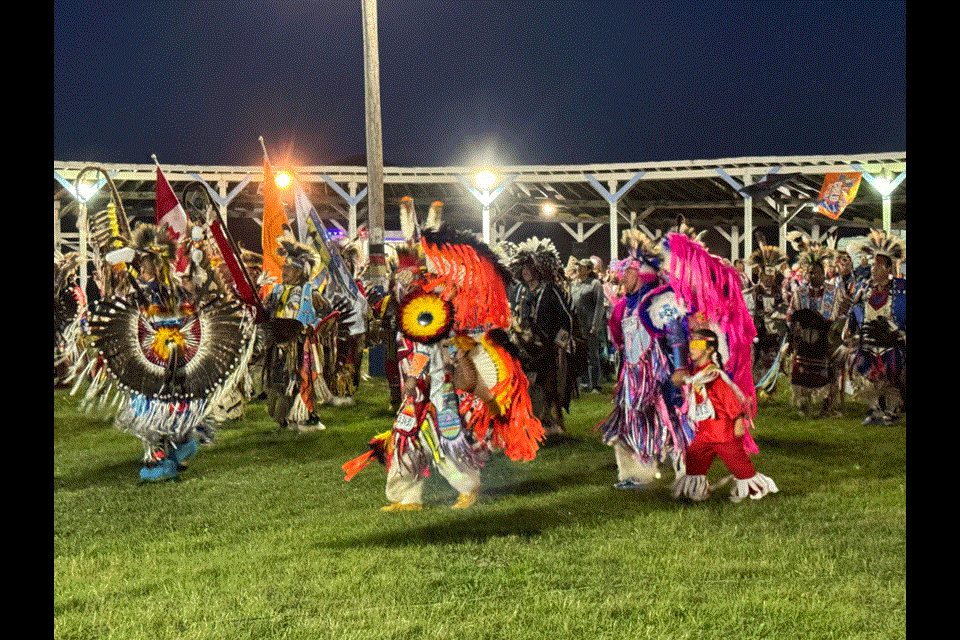 The grand entry displayed many colours as dignitaries were followed by the dancers into the circle at Lost Horse Hills. 