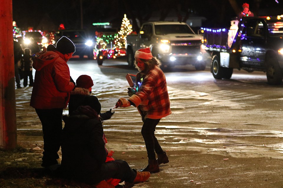 During the parade, Santa’s little helpers were busy handing out candy to the young and the young at heart.