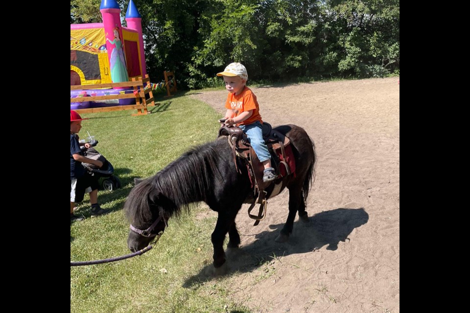 At the petting zoo, Clay Steciuk looked to be thoroughly enjoying his pony ride. But there were many other animals to meet as well.