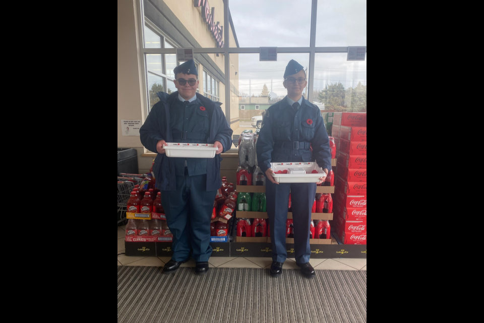 On Nov. 4, Canora air cadet members Max Paul, left, and Maisie Kuzminski were busy handing out poppies to shoppers at the Gateway Co-op Food Store.