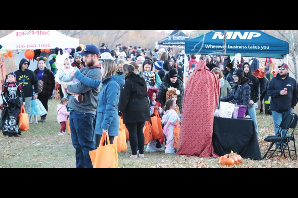 Many families were out to take in Pumpkin Lane in Weyburn on Sunday evening, with lots of candy treats available for trick-or-treaters.