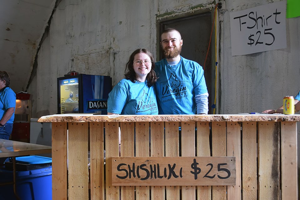 Ilyana Bloudoff and Ben Walker were at the front stand selling the plates of Shishliki.