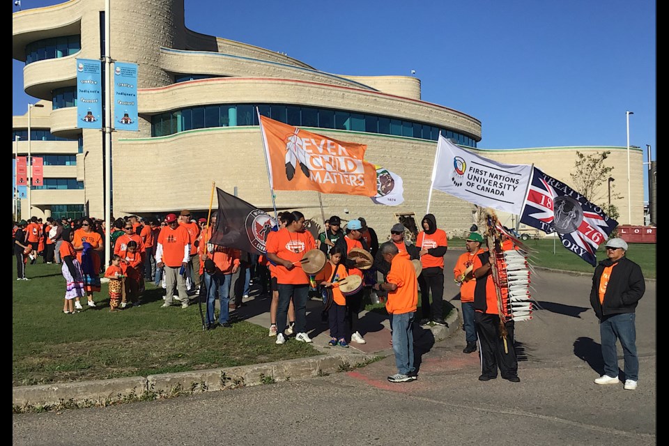 These are scenes from around the First Nations University of Canada on Friday for their annual Smudge Walk. Here, the scene at the start of the walk.