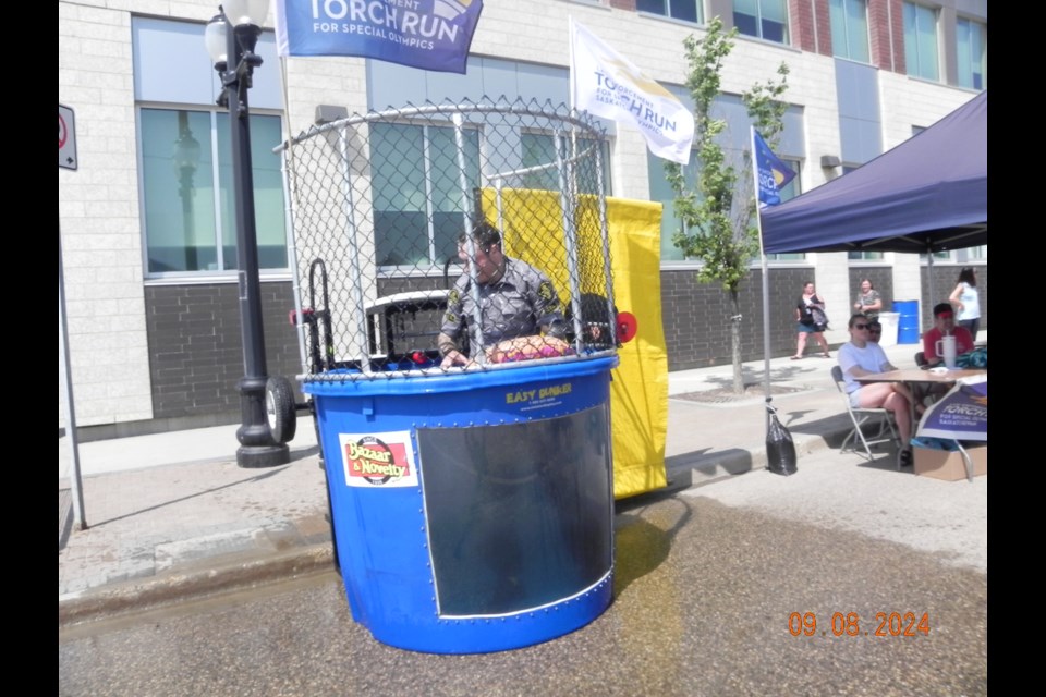 Member of the Saskatoon Police Service took turns being good sports at the dunk tank, benefitting Special Olympics, as part of their annual community barbecue and open house on July 10.