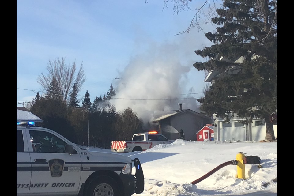 This was the scene Wednesday afternoon as a fire raged at a house on Cousins Drive, North Battleford.