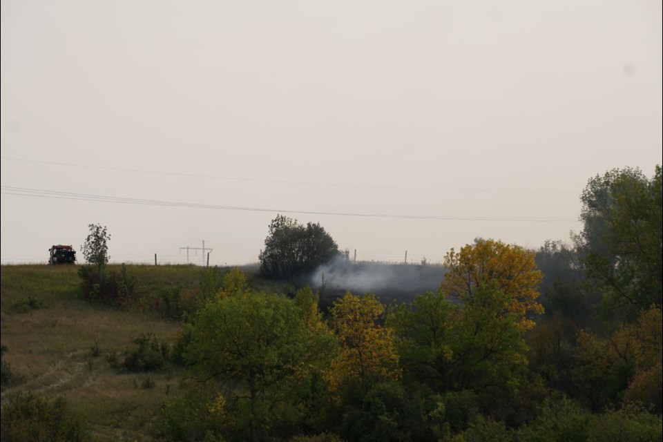 Firefighters are working at the scene south of Estevan Monday afternoon. 