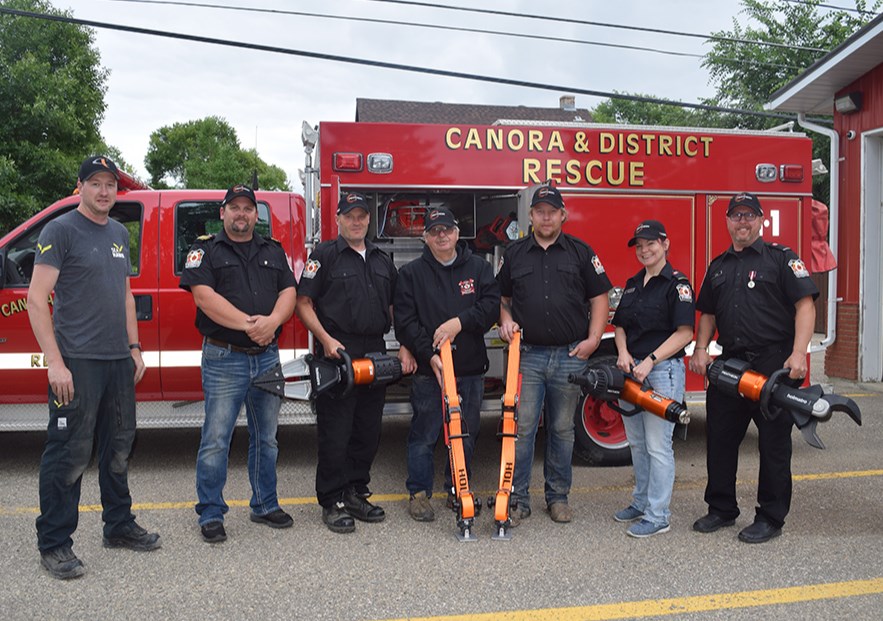 Canora and District Fire Rescue members welcomed Mike Beamish of Seahawk to the fire hall on July 4, as he brought in and installed several pieces of new battery operated hydraulic extrication equipment valued at around $70,000. From left, were: Beamish, Canora Fire Chief Jess Harper, and firefighters Sheldon Derkatch, Robert Engel, Will Dupperon, Cheri Kuhn and Shannon Leson. Harper said they appreciated the help from Beamish, and the financial assistance from SGI through the TREX (Transportation Rescue Extrication) program.  