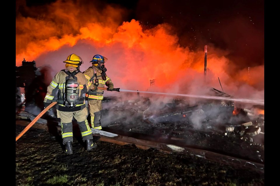 Melfort Fire Department crew worked to containthe fire but the house was a complete loss.