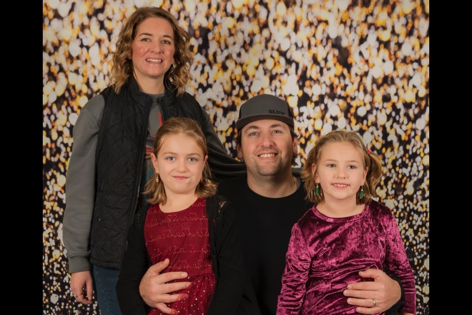 Chantelle and Cody Loewen with their daughters Kensley and Brexley are settling in a new place in Macoun after a fire completely destroyed their house earlier in December.