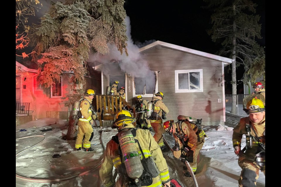 Fire crews were able to contain a duplex fire to one suite during a Friday night blaze.