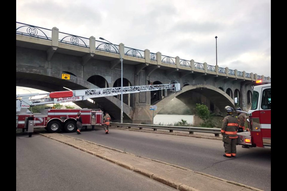 The Saskatoon Fire Department first received a report of a fire under the bridge at about 12:41 a.m. on June 21. When they arrived, identified an abandoned encampment on fire under the bridge.