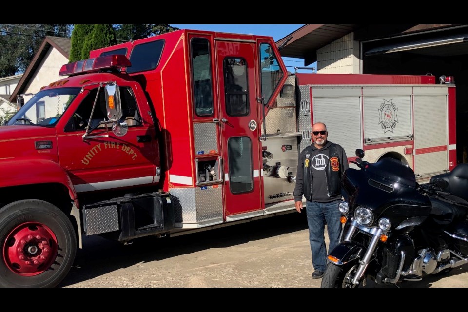 Motorcycle enthusiast and fire fighter Dale Lumley successfully captures a letter for his Red Knights patch.  