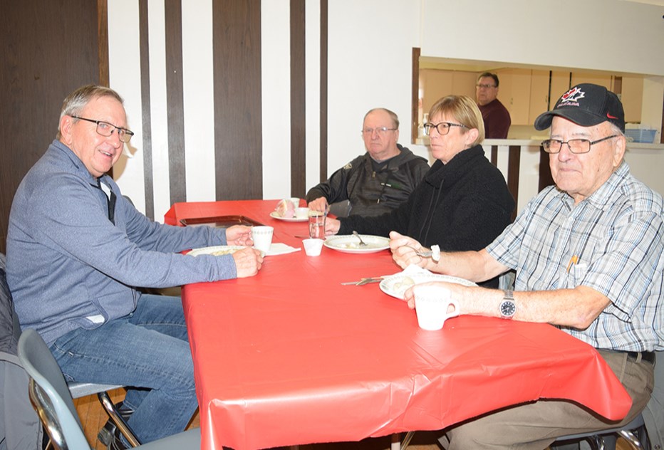 This group was among the first in line to enjoy the Borscht & Perogy Lunch and Supper at Rainbow Hall in Canora on Dec. 7. From left, were: Darryl Stevenson, Bill Gulka, Vickie Stevenson and Orest Lewchuk.