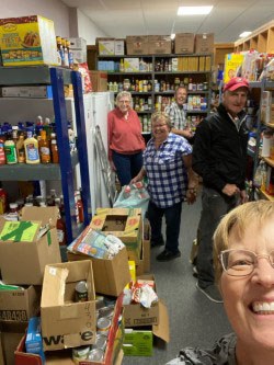 Food bank volunteers Terry and Tomi Watt, Kevin and Chris Kotzer and Doreen Buckley worked hard to weigh and organize all the donations from the community.