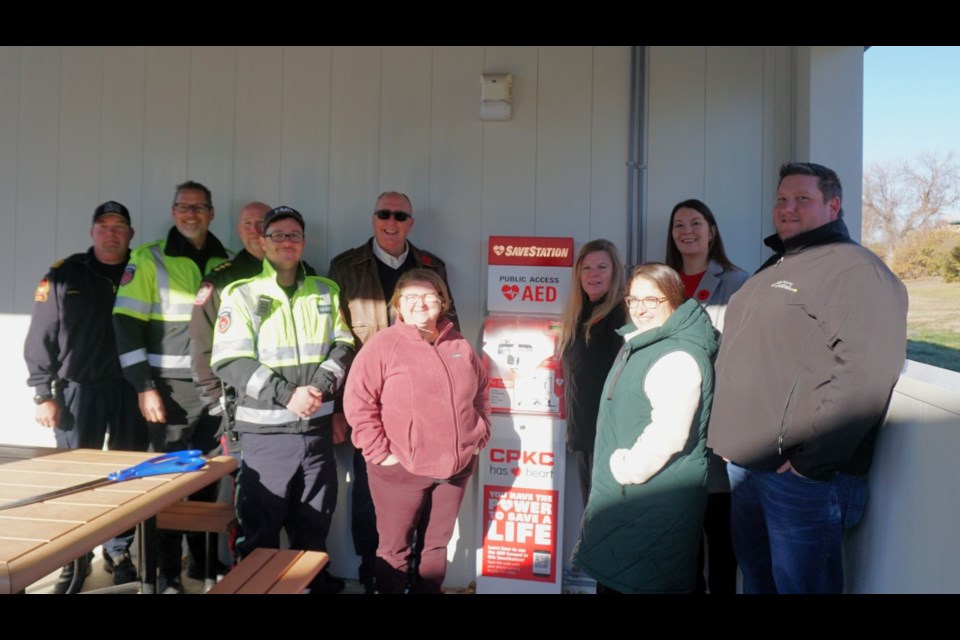 From left, Estevan Fire Chief Rick Davies, Estevan EMS paramedic Brad Robinson, Deputy Police Chief Warren Morrical, paramedic Jessie Klatt, Mayor Roy Ludwig, parks manager Shannon Wanner, safety co-ordinator Helen Fornwald, councillors Kirsten Walliser and Rebecca Foord and city manager Jeff Ward unveiled the new AED station at Churchill Park. 