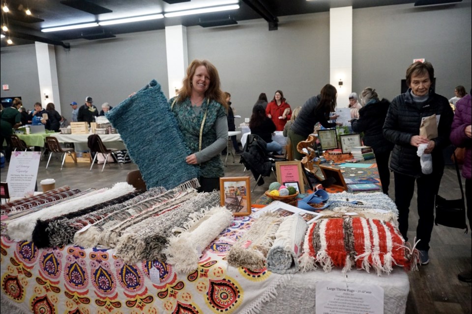          Emily Gillies of Estevan was at the Health Fair selling her handwoven rugs, bags and pillows, and also offering the chance to sign up for reiki sessions.                      