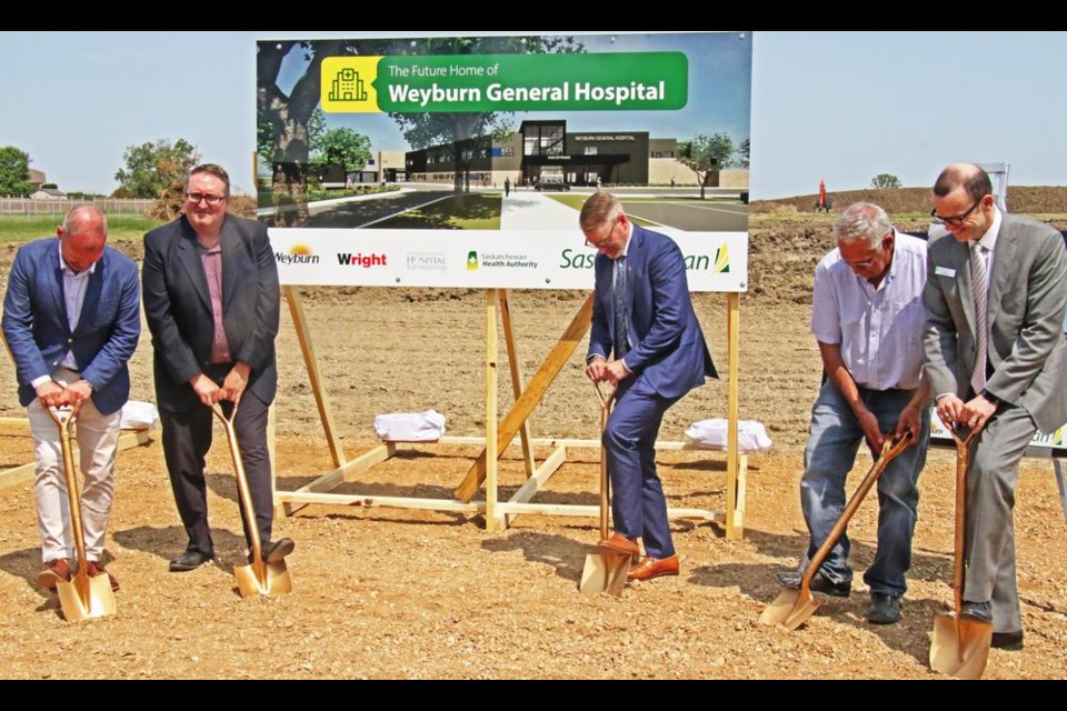 The five dignitaries did the ground breaking for Weyburn's new hospital, including MLA Dustin Duncan, Hospital Foundation chair Jeff Hayward, minister Everett Hindley, Mayor Marcel Roy and SHA COO Derek Miller.