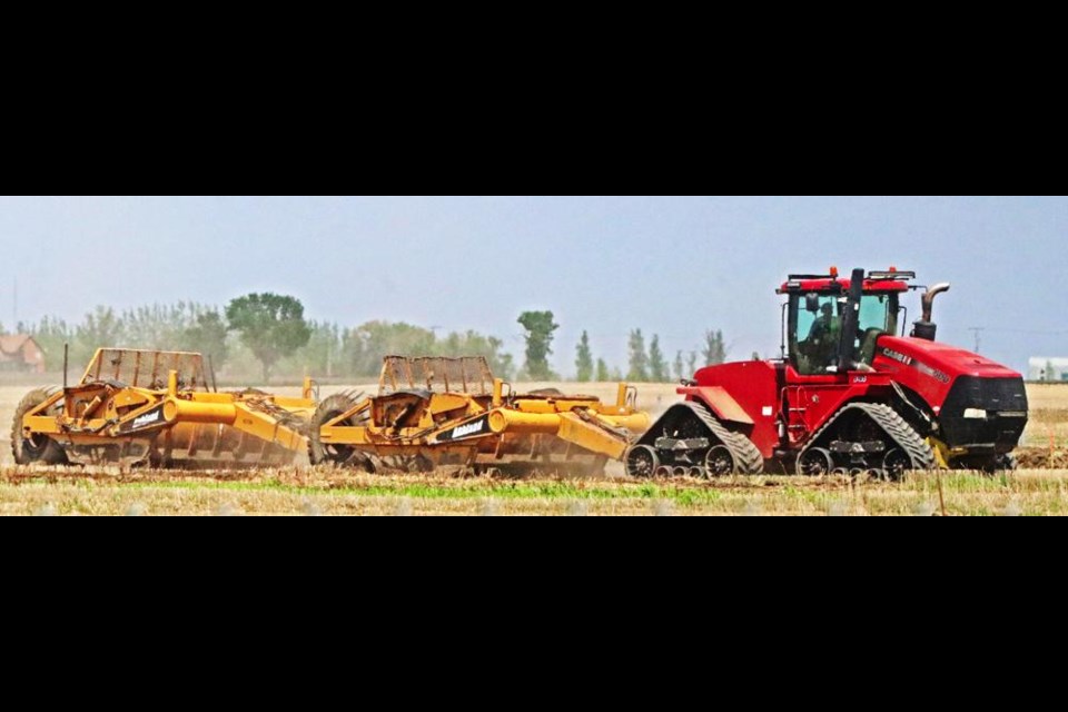 An earth-mover began with the task of removing topsoil to prepare for the start of construction of the new hospital for Weyburn.