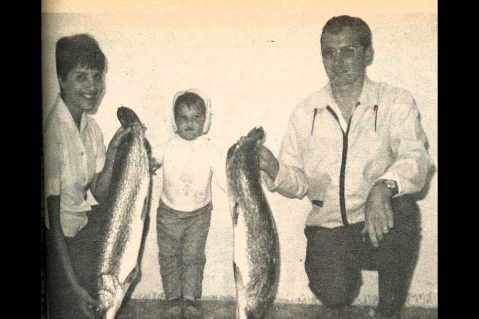 Sharon and Graydon Olsen show off their “his-and-hers” trophy fish caught at Greg Lake. The 12-pound-plus pike were barely ounces apart in weight although Sharon’s was slightly heavier.