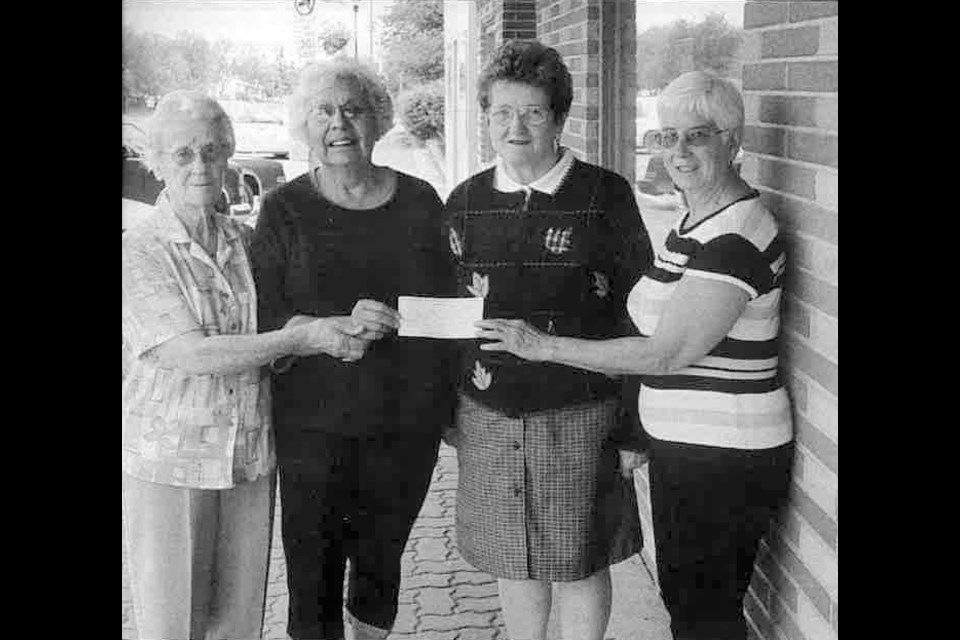 The Unity Lioness club donated the last of their money, over $3,000, to the Seniors’ Lodge Project. Gladys Kelly, second from left, accepts the cheque from Elsie Delahoy, Irene Thiessen and Clara Eltom. With dwindling membership, the Lionesses ended their efforts in 2003 after decades of serving the community. 
