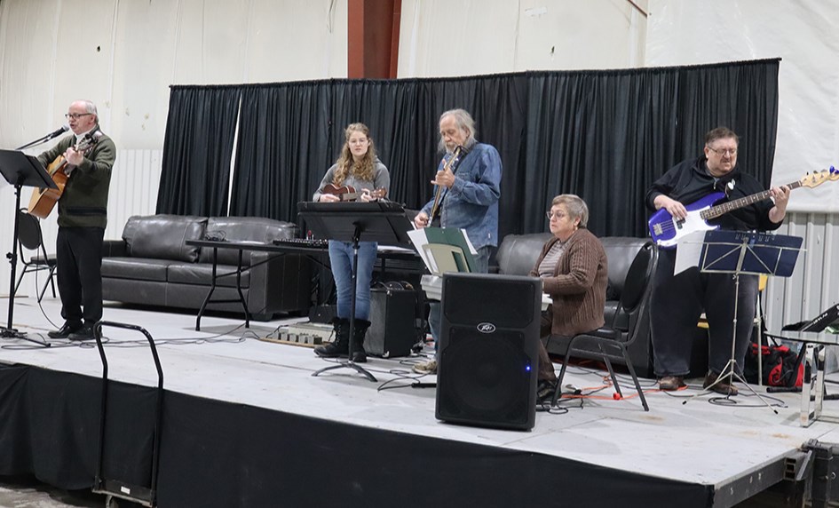 A non-denominational church service opened the final day of Hockey Day in Saskatchewan on Sunday, Jan. 19 at Canora’s Sylvia Fedoruk Curling Rink. Providing the music, from left were: Greg Bright (acoustic guitar, vocals), Cherish Lazaroff (ukulele), AJ Bathgate (banjo), Carolyn Bright (keyboard) and Wes Popoff (bass).