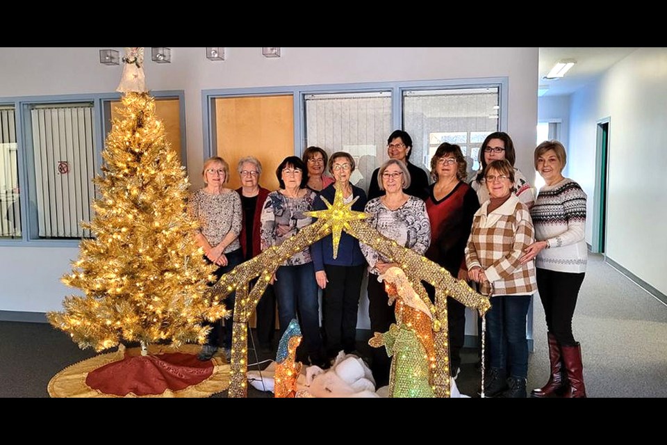Some of the organizing committee for the Nativity Event at St. George’s Catholic Church December 1 and 2. Carla Leduc, Adriane Delorme, Pat Piche, Sue Robinson, Irene Montgomery, Rosanne Delorme, Bev Monea, Eveline Bahuaud, Christine Pasloski, Monique LeClaire, Janice Erfle. 
