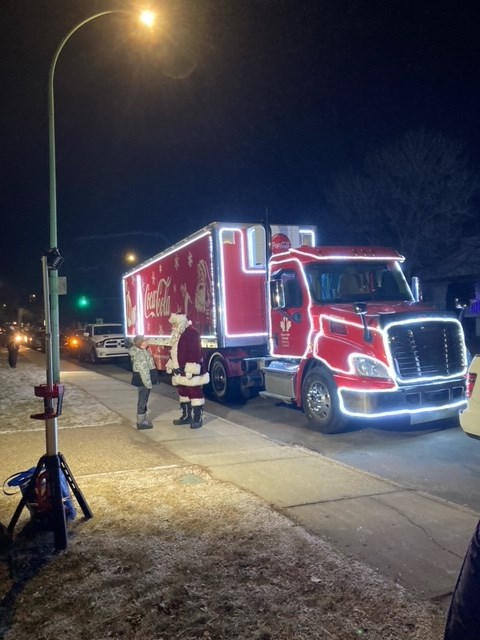 Santa made frequent stops to meet and greet children and families along his route of the Coca Cola Santa Tour, seen here in the Silverwood Heights neighborhood of Saskatoon the evening of Dec. 3.