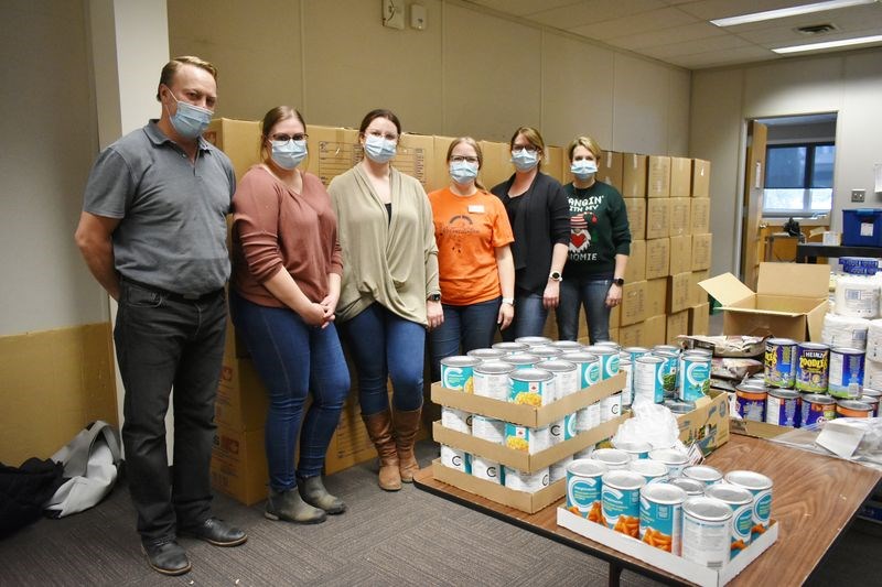 It was Friday, December 10 where it took the efforts of a full team to box up 161 Christmas hampers to be distributed to families in Kamsack. From left, were: Dale Polischuk (SIGN Director of Finance), Kira Olson (Kamsack Public health nurse), Chelsea Severson (Kamsack Public Health Nurse), Candice Nelson (me! SIGN Positive Impact), Shelley Zoerb (SIGN Director of Operations) and Reagan Foster (Norquay Helping Hands).