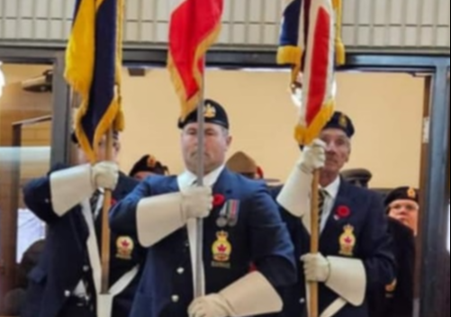 Corporal James Quiring leads the colour party and members of the Royal Canadian Legion Unity Branch No. 90 into St. Peter's Roman Catholic Church on Nov. 11.