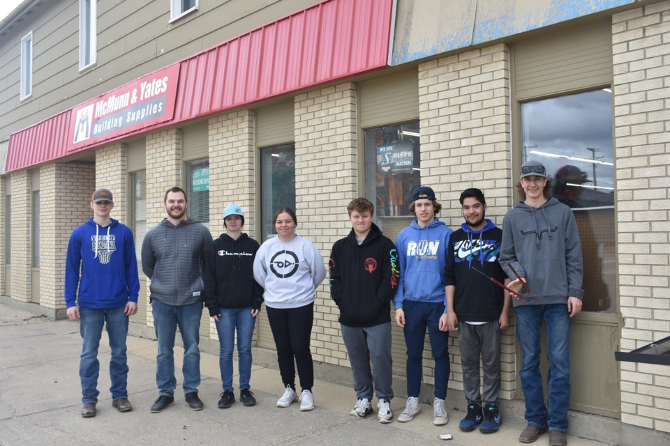 Manning the barbecue, from left,  were the KCI students and teacher: Ty Thomas, Zachary Fedorak (teacher), Kaylie Harper, Gerri Basaraba, Declan Kosokowsky, Levi Erhardt, Jesse Gigun, and Austin Krawetz.