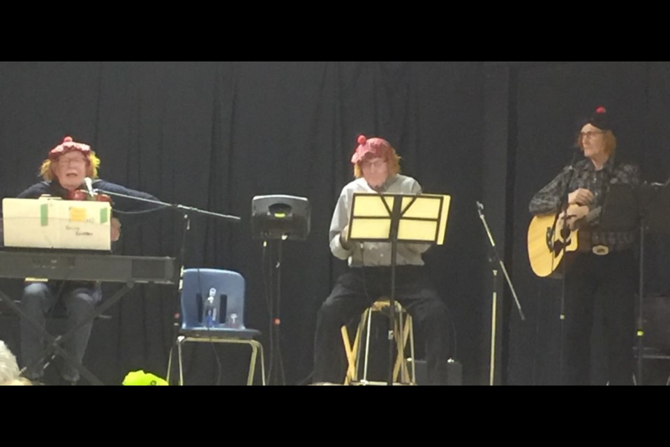 Celtic Country – Bob Wardhaugh, Archie Wainwright and Ed Neufeld — in their Scottish tams during their performance for the Borden Friendship Club Feb. 29.