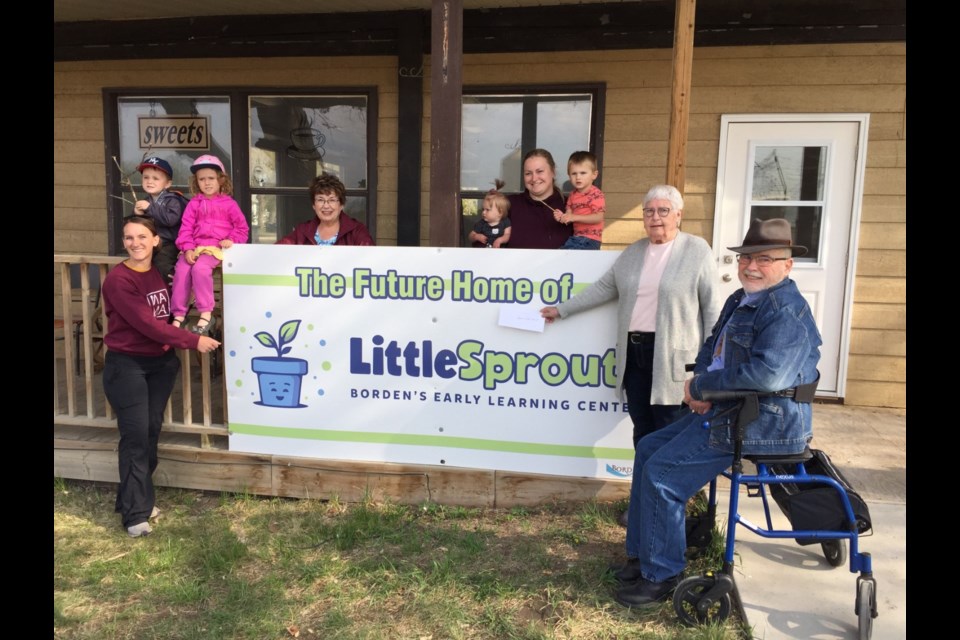 St. John's Anglican Church made a $5,000 donation to Borden Municipal Childcare (Little Sprouts). In the photo are Emily Saunders, Sharon Assman, Jillian Orchard, Sandra Long and Rev. Carr. 