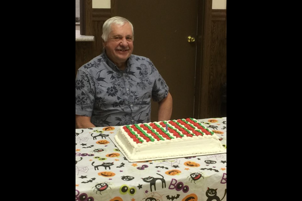 Peter Thiessen was the lone October birthday celebrant on hand to blow out the cake candles at the Borden Friendship Club potluck supper Oct. 26.