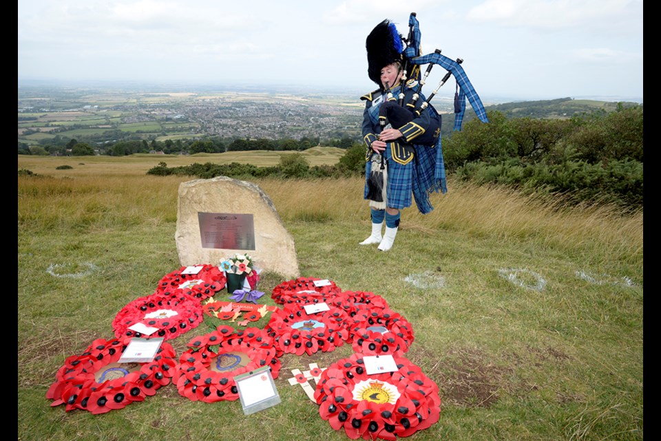 RAF Piper Squadron Leader Linda McLean, at the memorial dedication to honour and remember the crew of Halifax III bomber MZ311 EY-M (2 RAF; 5 RCAF) of 78 Squadron .