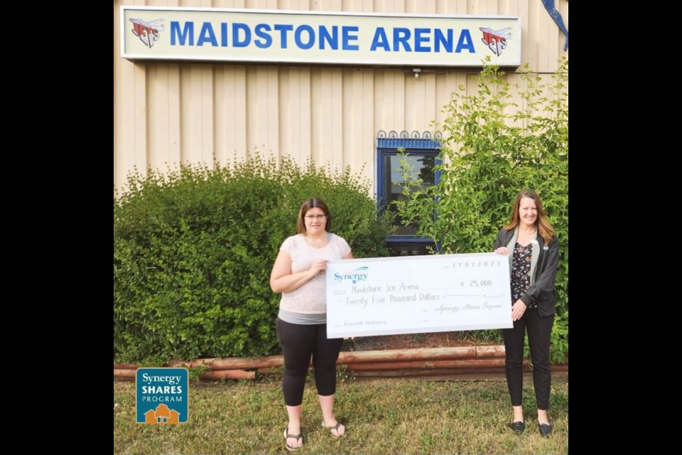 Jody Zerr, manager of Synergy Credit Union, Maidstone branch presented a $25,000 donation to Dawn Kinchen of Maidstone Ice Arena on July 12. 