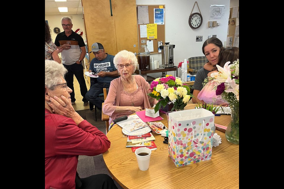 In the centre is 95-year-old Ann Ewanchuk former Whitkow hotel and bar owner enjoying her big birthday celebration at Ruth Whyte Manor in North Battleford.