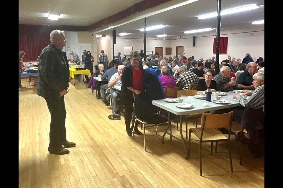 Part of the Rabbit Lake Community Hall filled with a good-sized crowd Oct. 14. The other side of the hall was full also. 