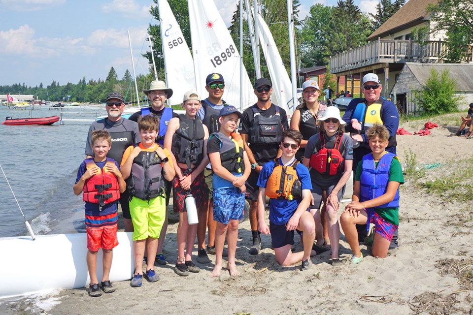 Meota Lake Front Paddle and Sail afternoon participants included: back row - Dave Martin, John Steele, Luke Forer (assistant), Karl Brady (head instructor), Meagan Morin and Patrick Eckerman; front row - Frank Acaster, Alexander Kramm, Davian VanEe, Nash VanEe, Luc Coutu (assistant), Trudy Janssens and Mannix Mercer.