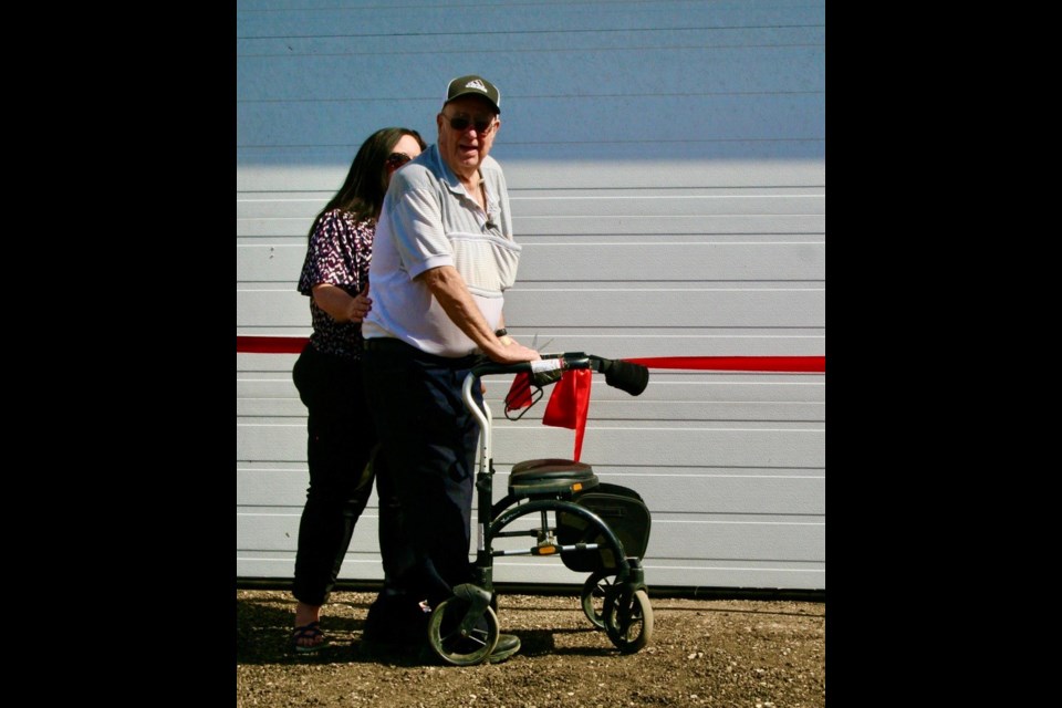 Two of the approximately 2,000 persons who attended the Sukanen Ship Museum threshing bee.