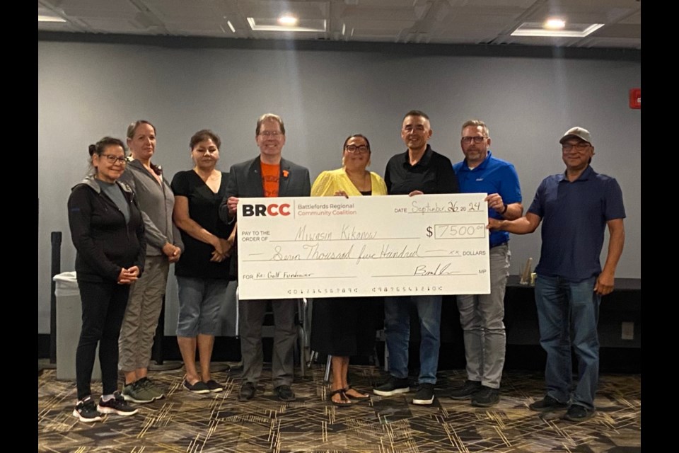 Shelter support worker Greta Fineday, cook Rachel Tuffs and Operational Manager Pearl Little, North Battleford mayor David Gillan, Lucky Man First Nation Chief Crystal Okemow, Councillor Ricky Moccasin of Saulteaux First Nation, Battleford mayor Ames Leslie and Chief Donny Ironchild of Little Pine First Nation.